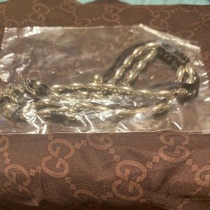 Ankle bracelet, double string, silver, with charm and balls.